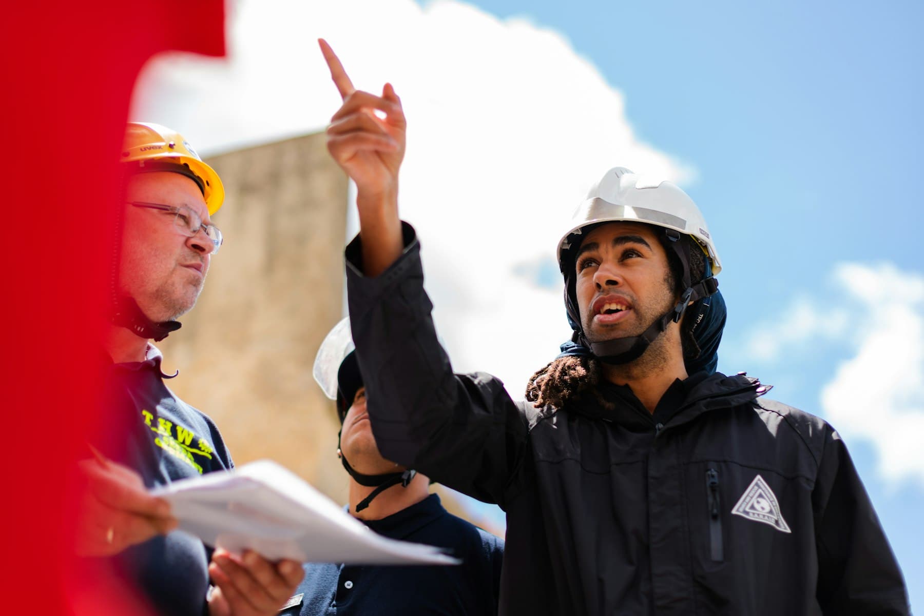 Engineer in a hard hat at an oil and gas site